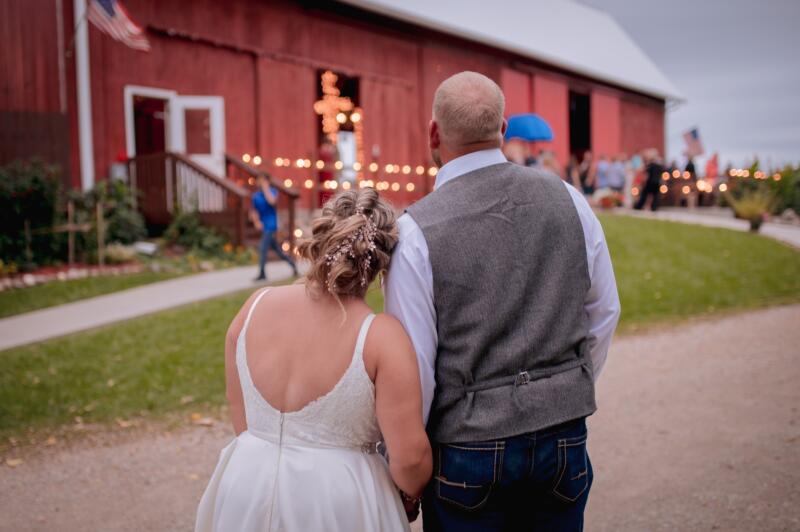 Couple getting married at Sugar Island Barn in Watertown WI
