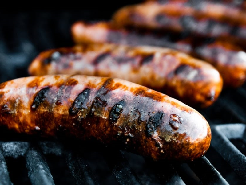 Untitled design (4) Bratwurst on the grill