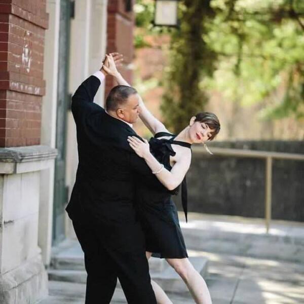Man and woman ballroom dancing