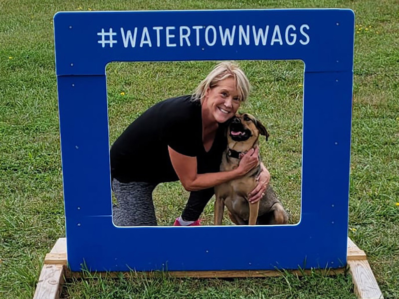 Watertown Dog Park Selfie Station Woman and dog posing in a selfie station at the Watertown Dog Park in Watertown Wi