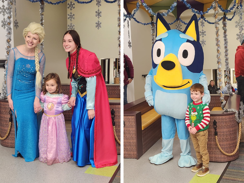 Child posing with Anna and Elsa and a child posing with Bluey
