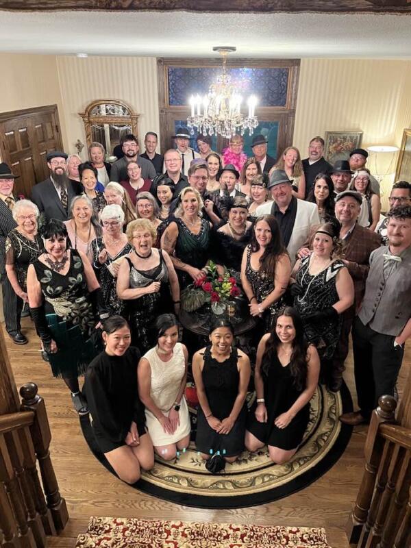 Group of people in 1920s attire at Wisteria Castle in Watertown wi