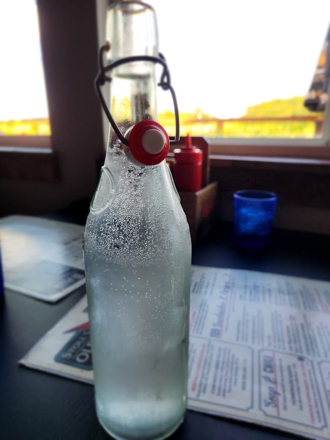 glass water bottle on table at Stoll's Olde 109 in Lebanon Wi