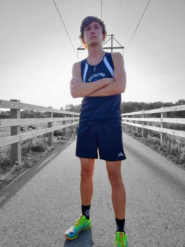 cross country runner posing on the Interurban Trail in Watertown Wi