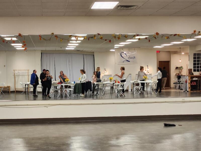 Mirror image of dancers relaxing at Ready 2 Dance in Watertown Wi
