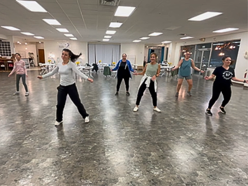 Group of people learning thriller dance moves at Ready 2 Dance studio in Watertown wi