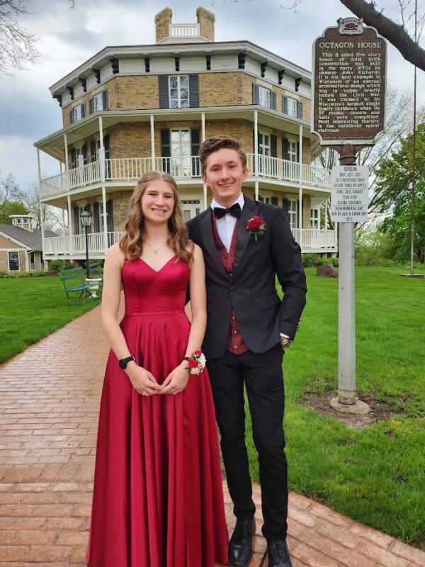 Boy and girl posing for prom in front of the Octagon House Museum in Watertown Wi