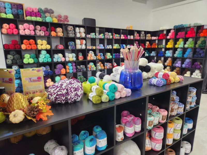 20251110_075558 Yarn on shelves in foreground and background