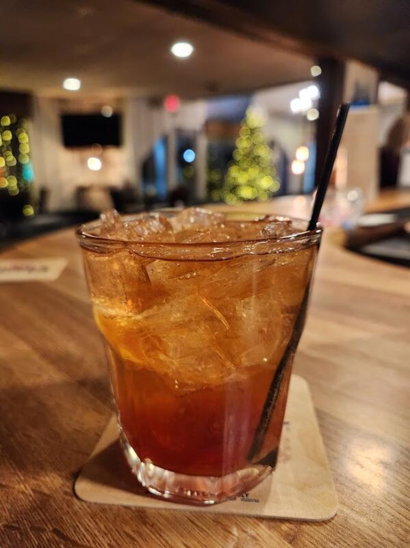 Old fashioned drink on a bar.