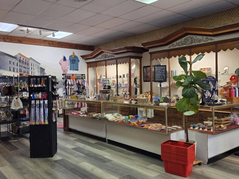 The Basket bar A shop with gift items on shelves.